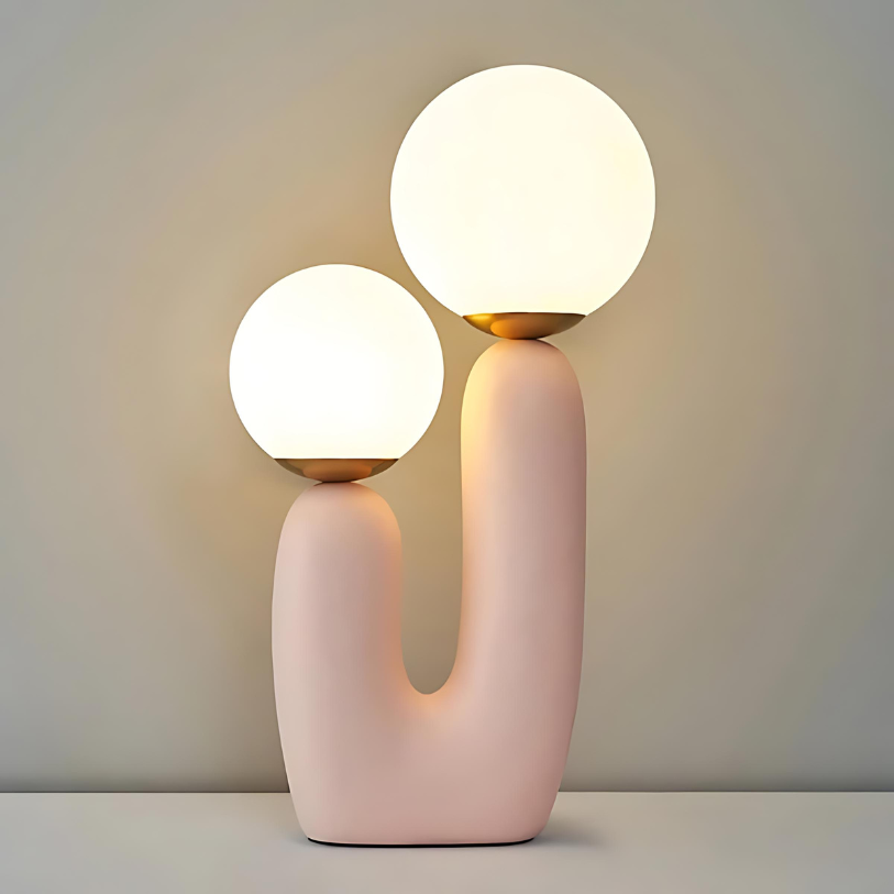 Dvoukulová pryskyřičná stolní lampa v jemných pastelových odstínech