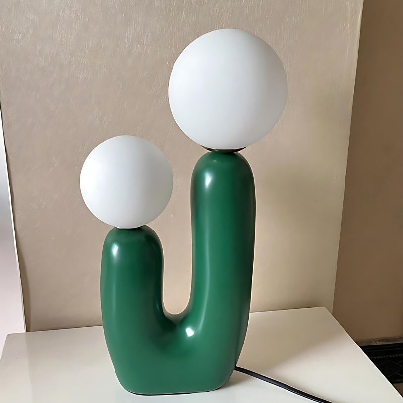 Dvoukulová pryskyřičná stolní lampa v jemných pastelových odstínech