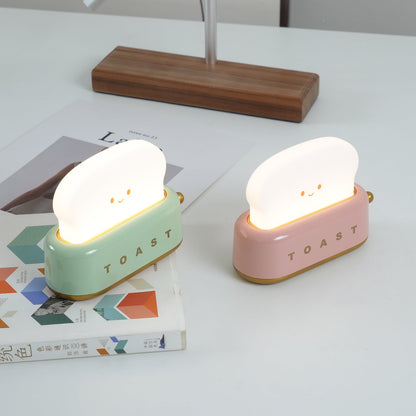 Dobíjecí stolní lampa ve tvaru toustovače
