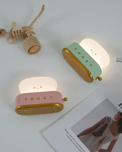 Dobíjecí stolní lampa ve tvaru toustovače