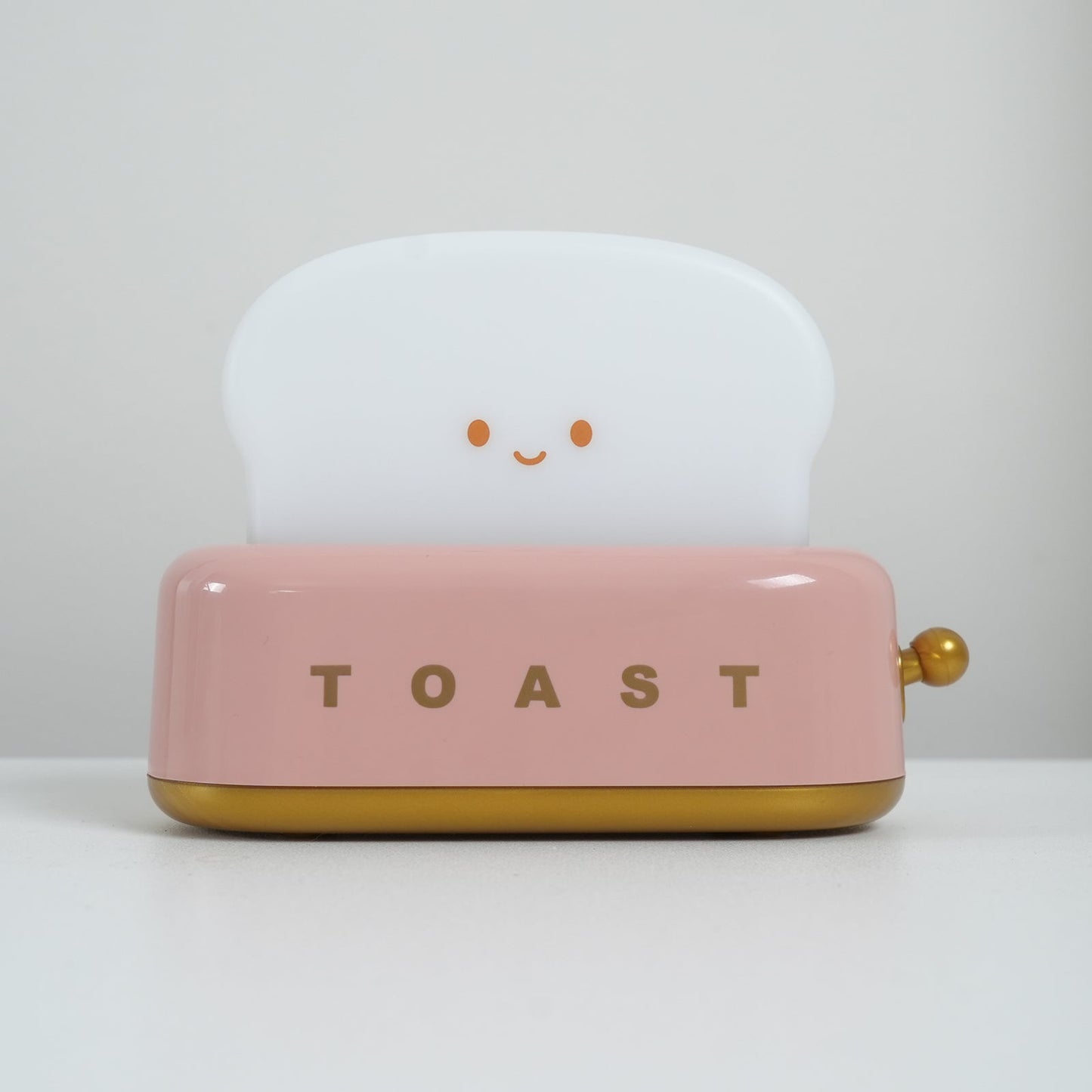 Dobíjecí stolní lampa ve tvaru toustovače