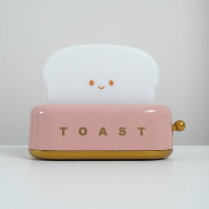 Dobíjecí stolní lampa ve tvaru toustovače