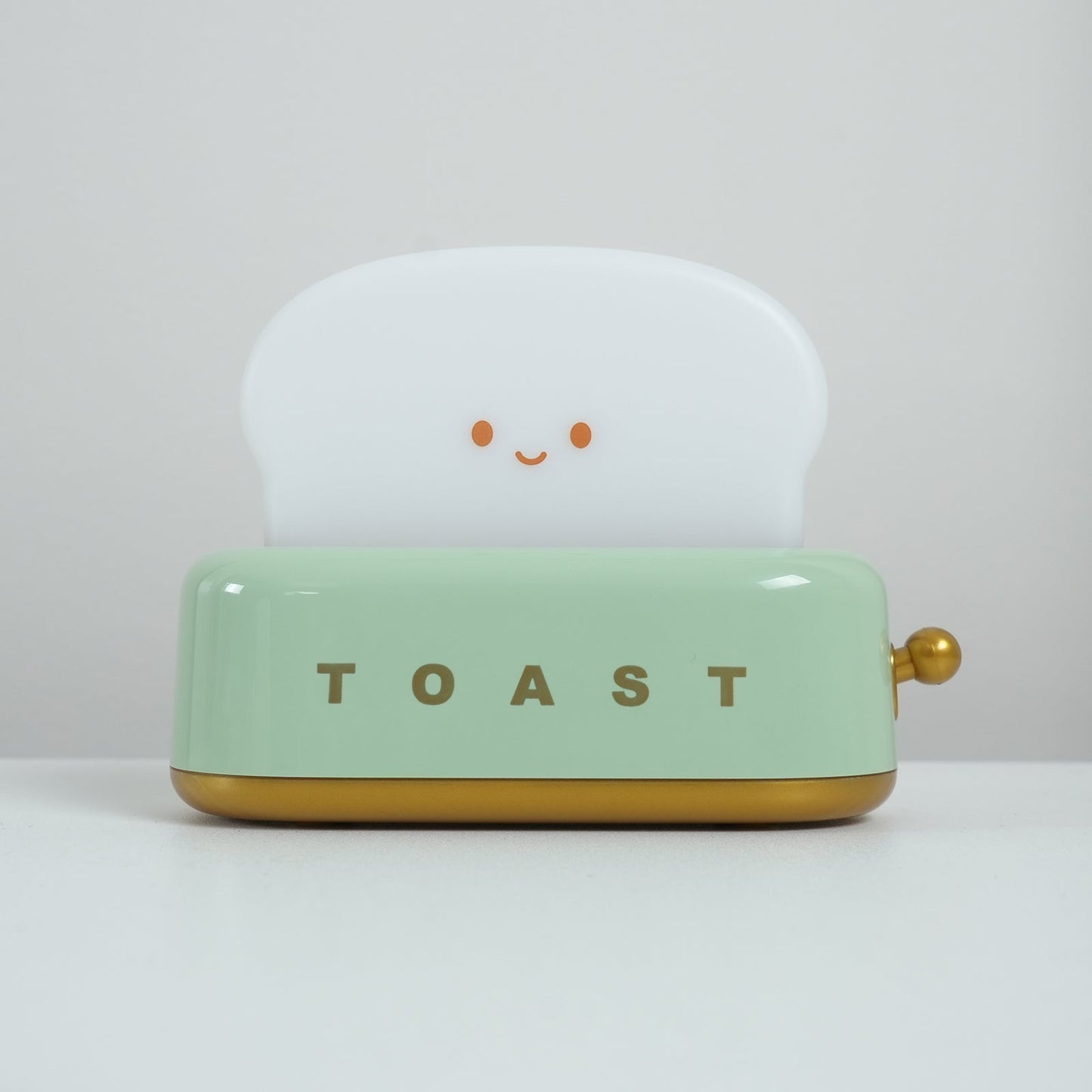 Dobíjecí stolní lampa ve tvaru toustovače