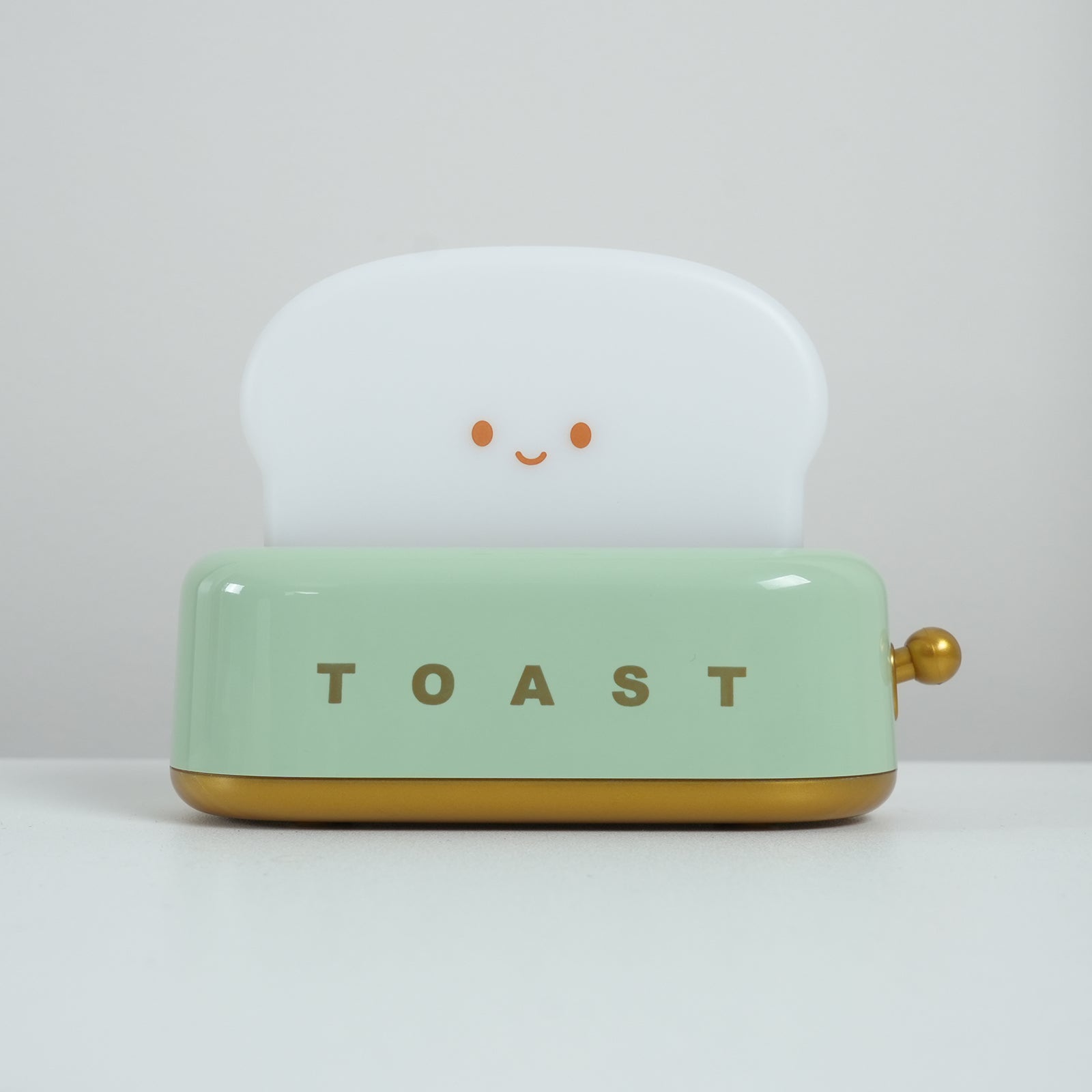 Dobíjecí stolní lampa ve tvaru toustovače