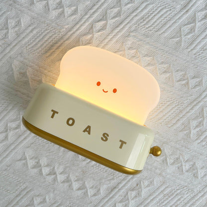 Dobíjecí stolní lampa ve tvaru toustovače