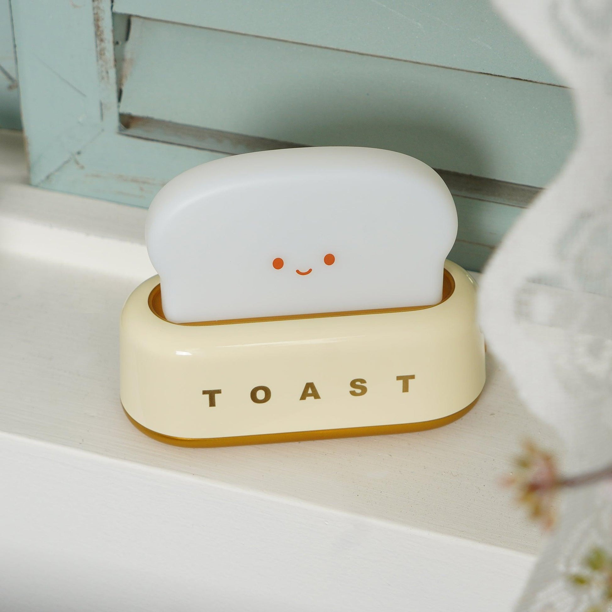 Dobíjecí stolní lampa ve tvaru toustovače
