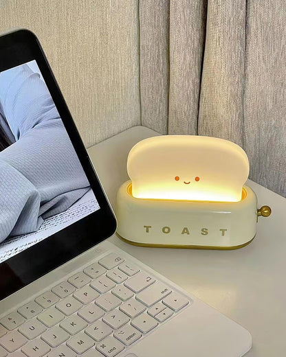 Dobíjecí stolní lampa ve tvaru toustovače