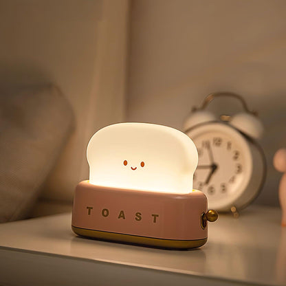 Dobíjecí stolní lampa ve tvaru toustovače