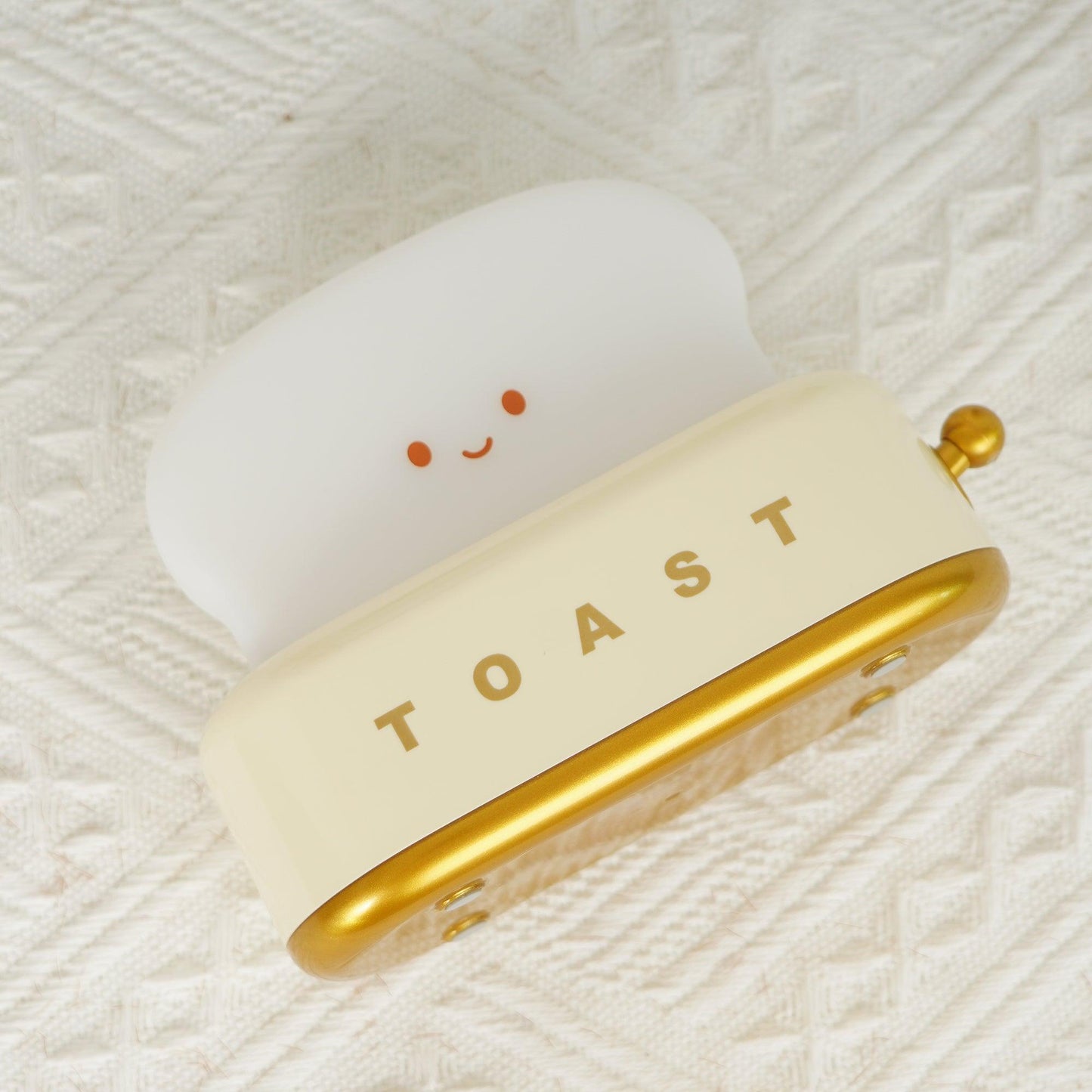 Dobíjecí stolní lampa ve tvaru toustovače