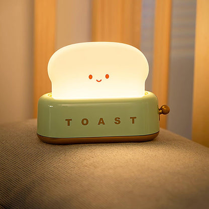 Dobíjecí stolní lampa ve tvaru toustovače