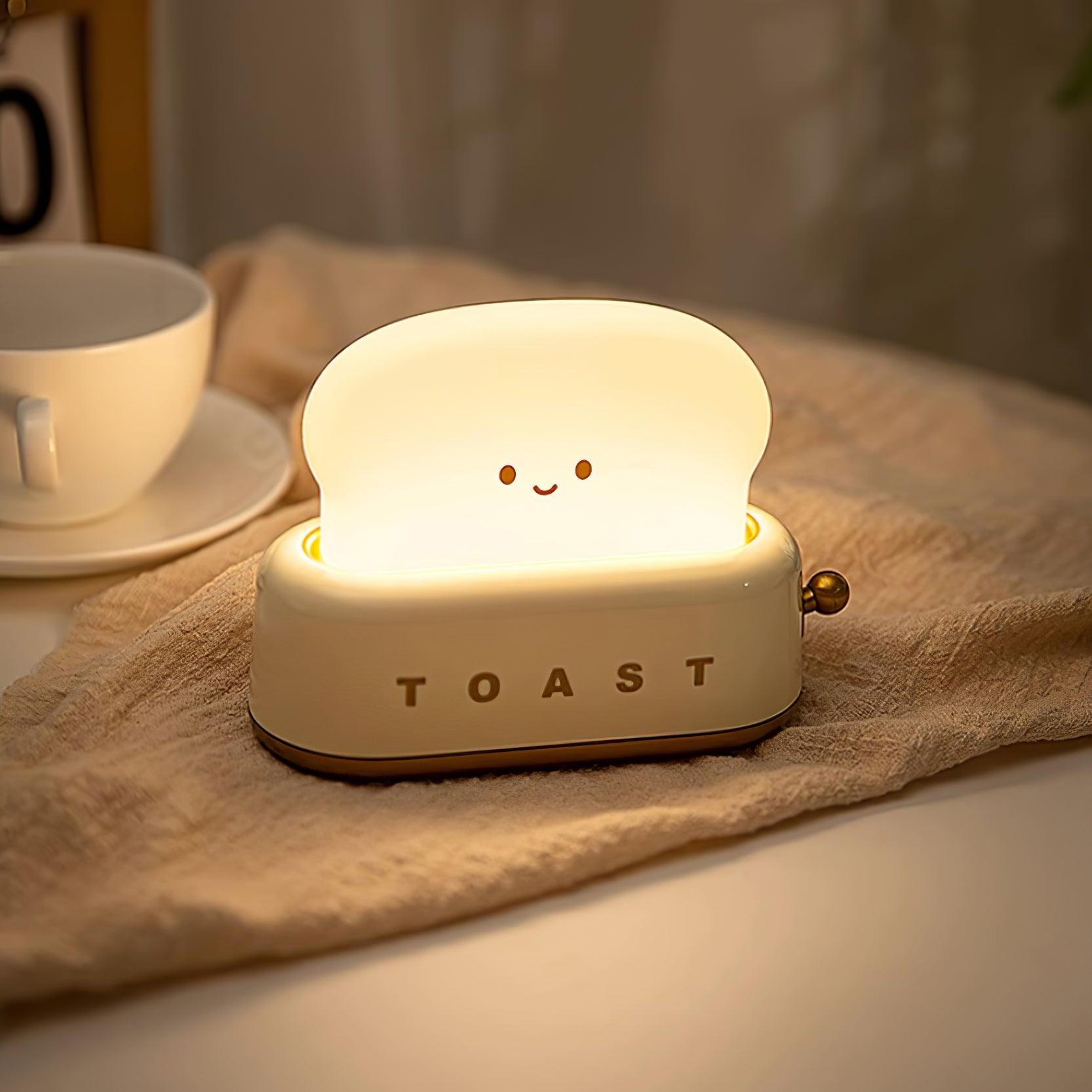 Dobíjecí stolní lampa ve tvaru toustovače