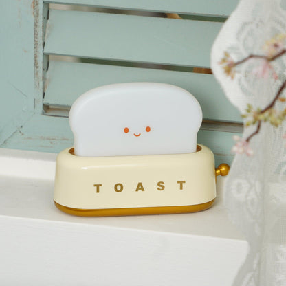 Dobíjecí stolní lampa ve tvaru toustovače