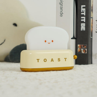 Dobíjecí stolní lampa ve tvaru toustovače