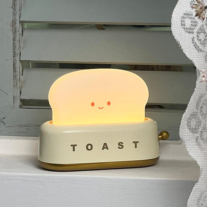 Dobíjecí stolní lampa ve tvaru toustovače
