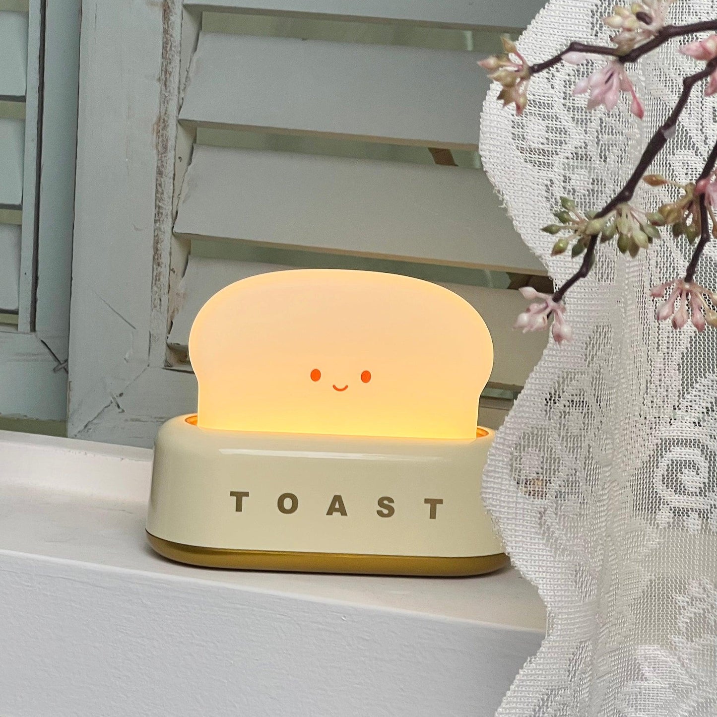 Dobíjecí stolní lampa ve tvaru toustovače
