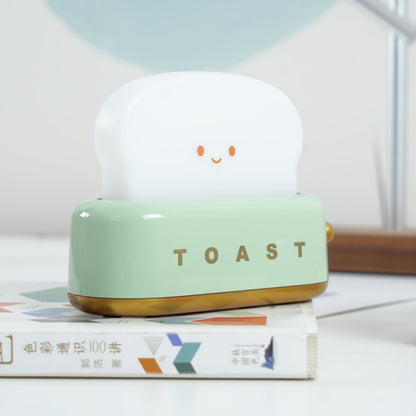 Dobíjecí stolní lampa ve tvaru toustovače