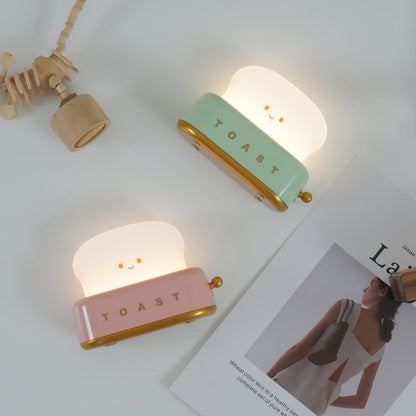 Dobíjecí stolní lampa ve tvaru toustovače